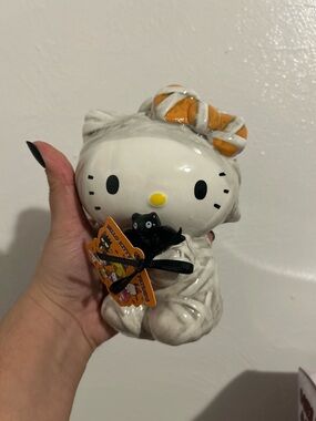 Blue Sky White Ghost Kitty Figurine with Orange Bow and Black Cat Accent